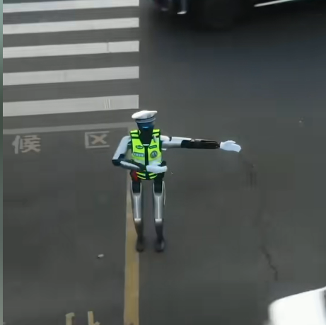 21點:无锡街头惊现机器人交警 会指挥还会比耶合影